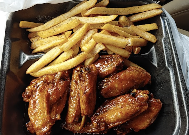 Archibald & Woodrow's BBQ signature dishes Jumbo Hot Wings
Catfish Dinner
Rib Dinner
